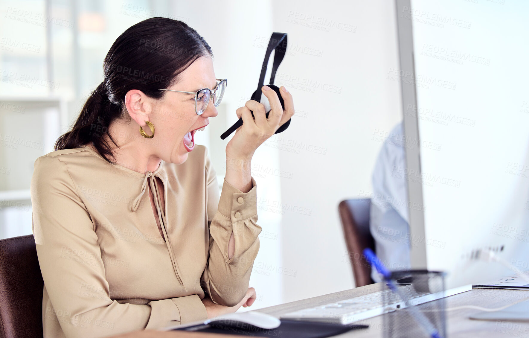 Buy stock photo Angry, call center and woman scream in office for customer service, telemarketing and consulting. Crm company, burnout and female worker stressed out, frustrated and shouting with anger at client