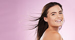 Hair care, beauty and portrait of a woman in a studio with a cosmetic, makeup and salon treatment. Happy, smile and female model with shiny and healthy hairstyle by pink background with mockup space.