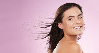 Buy stock photo Hair care, beauty and portrait of a woman in a studio with a cosmetic, makeup and salon treatment. Happy, smile and female model with shiny and healthy hairstyle by pink background with mockup space.