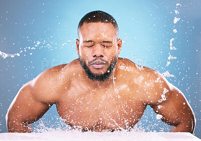 Buy stock photo Water splash, cleaning or black man with face wash for skincare, fresh clean hygiene on studio background. African model in beauty, wellness and washing, grooming  or cleansing for facial treatment