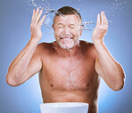 Skincare, senior man and water splash with basin, dermatology and guy with blue studio background. Face detox, mature male and old gentleman with clear liquid, hygiene or aqua for freshness with bowl