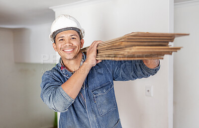 Buy stock photo Construction worker, home renovation and portrait of man holding wood for maintenance. Working, smile and house development project employee and builder or handyman for architecture or industrial job