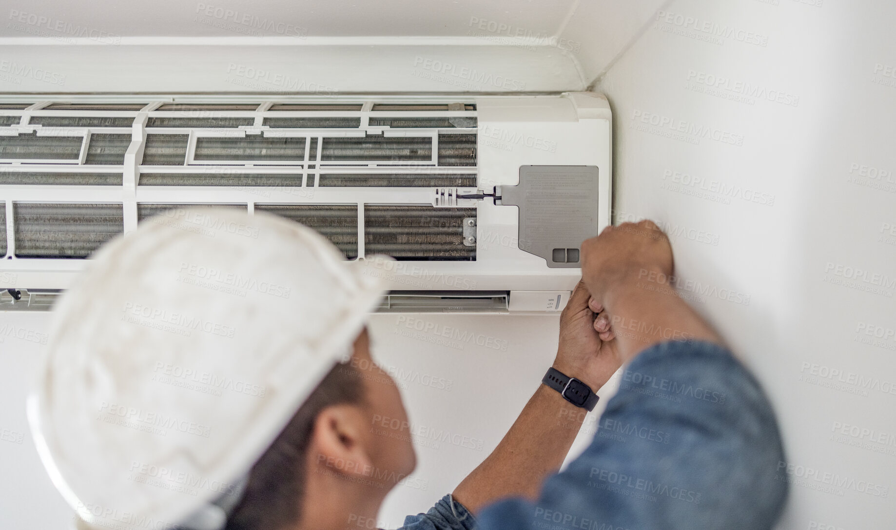 Buy stock photo Air conditioner, ac repair and maintenance of a handyman and builder working on home renovation. Electric technician, service worker and contractor in a house for equipment installation on wall