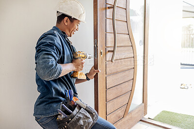 Buy stock photo Locksmith, man and maintenance, handyman with home renovation and fixing, change door locks with power tools. Construction, building industry and trade with manual labour, vocation and employee