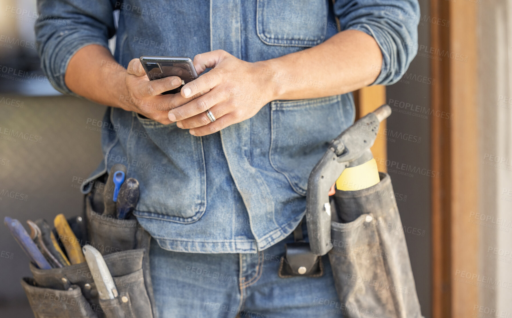 Buy stock photo Closeup, hands and man with smartphone, maintenance and research for instructions, deadline or schedule. Zoom, male or handyman with cellphone, social media or typing for connection or search on site