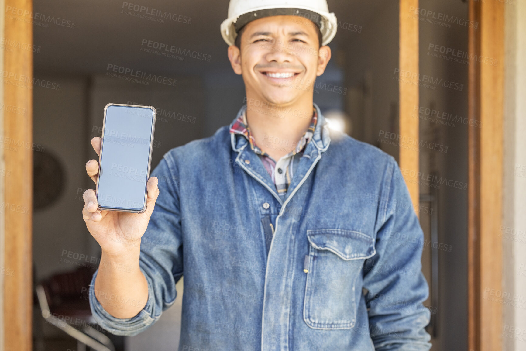 Buy stock photo Construction worker, man in portrait and smartphone, screen with mockup and contact, digital marketing and handyman. Home renovation, maintenance and industry trade, promo with product placement