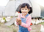 Portrait, Asian girl and farm for agriculture, chicken and happiness on holiday, vacation and holding eggs. Face, female child or kid in Japan, farming and sustainability with animals and countryside