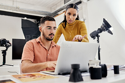 Buy stock photo Photography, laptop production edit and collaboration of creative design employee after photoshoot. Studio. teamwork and magazine shoot planning of photographer agency workers with communication