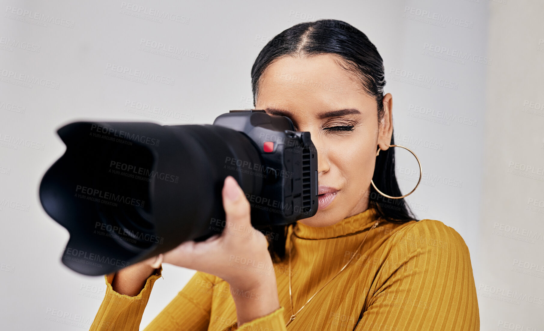 Buy stock photo Black woman, photographer and camera for photoshoot, digital agency and production process. Photography, African American female and artist with device to shoot in studio, creative media and employee