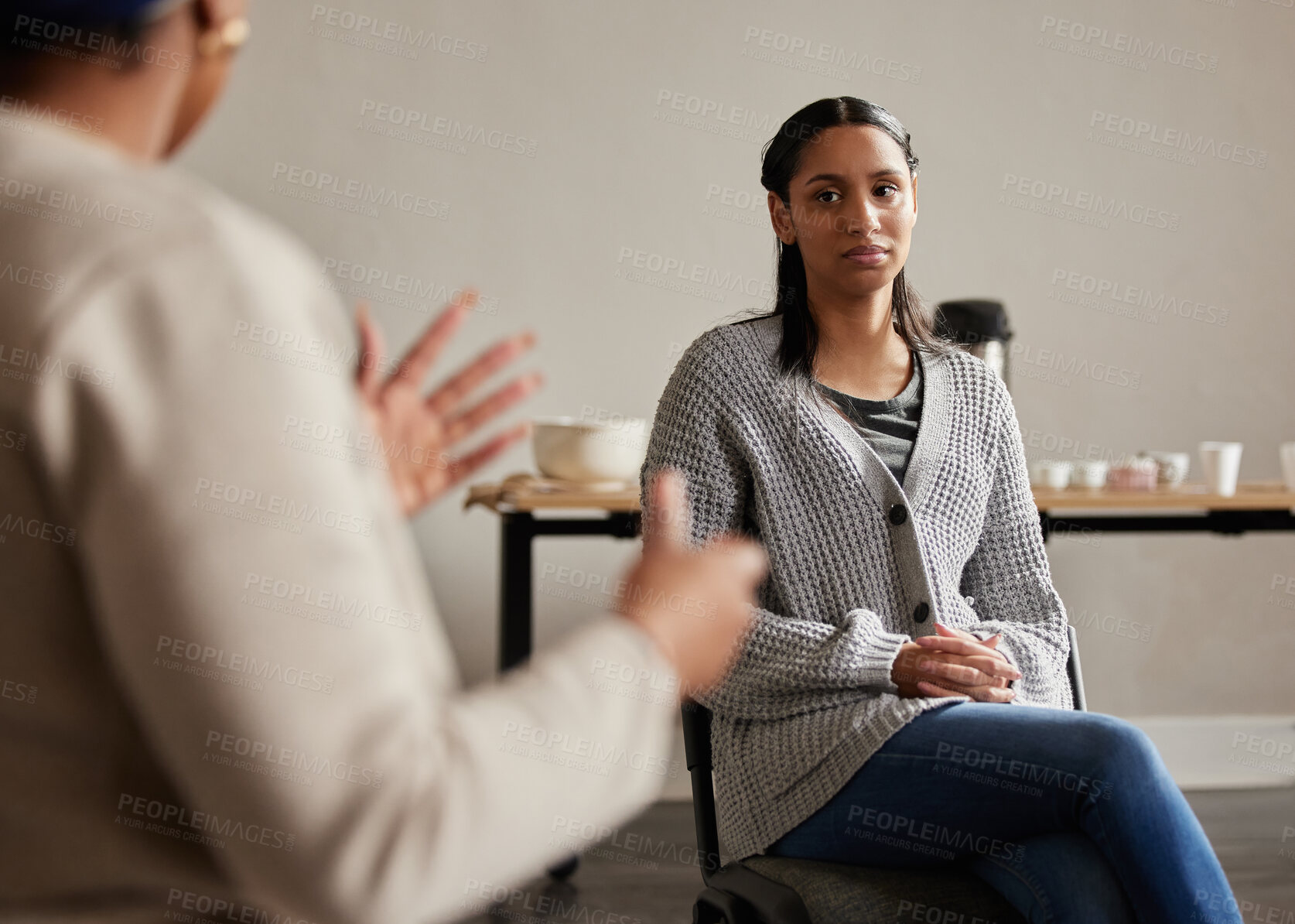 Buy stock photo Mental health, black woman and group therapy with advice, sharing feeling and talking in trust session. Support in addiction, grief or depression, woman and therapist or psychologist sitting together