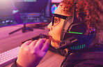 Video game, girl and talking on headphones in home for esports, online games and virtual competition. Female gamer, computer live streaming and gaming in neon lighting, technology and gen z streamer