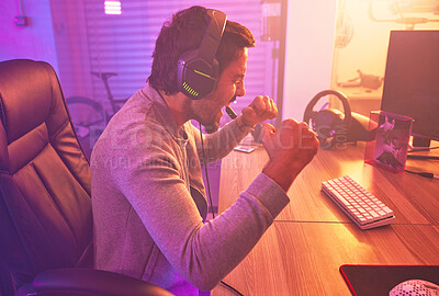 Buy stock photo Winner, excited or man gamer on computer with microphone celebrating game win and success fist. Happy, cheering or esport player celebration for online competition, wow with progress and achievement
