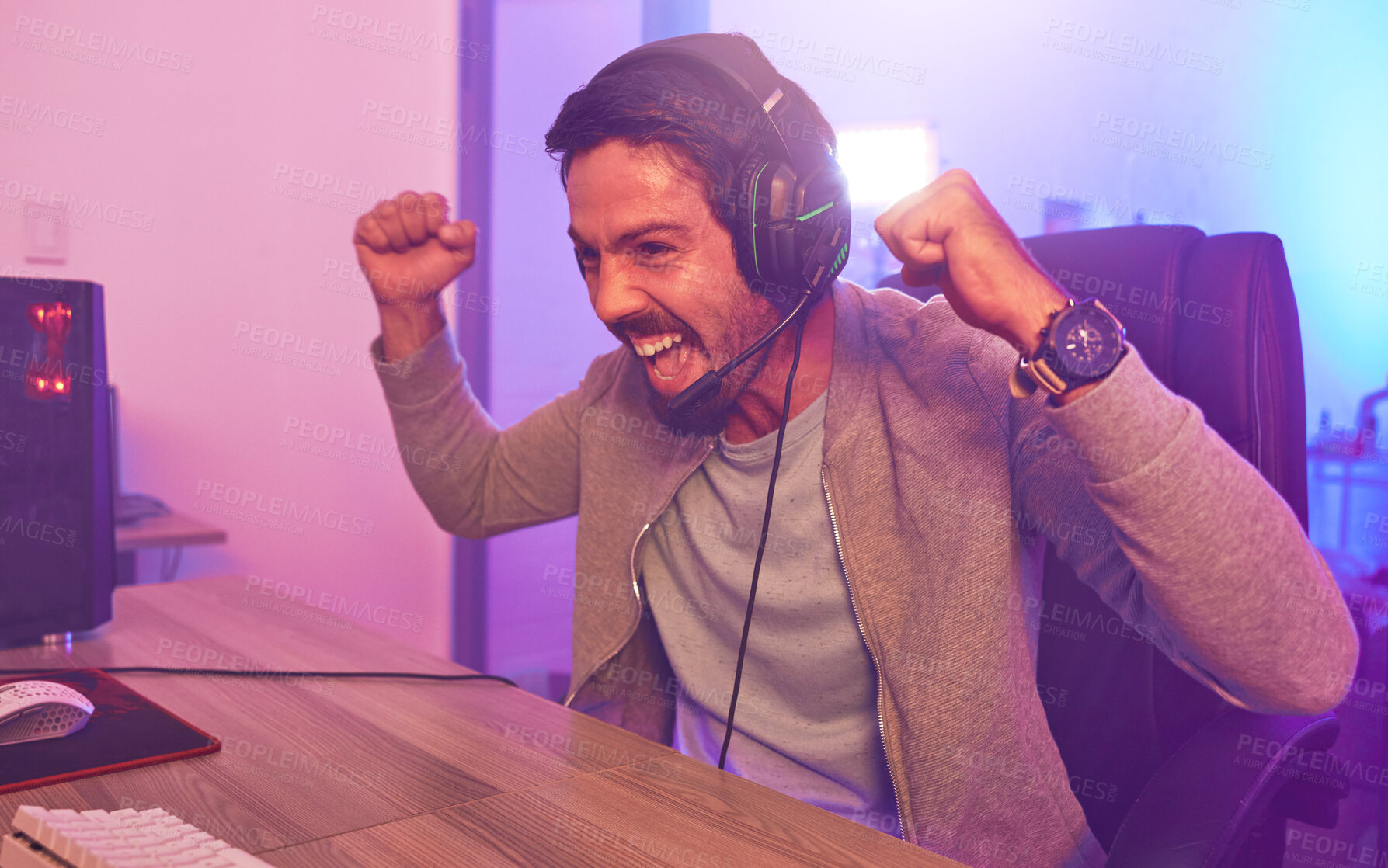 Buy stock photo Winner, achievement or man gamer on computer with microphone celebrating game win and success fist. Happy, cheering or esport player celebration for online competition, excited on gaming progress 