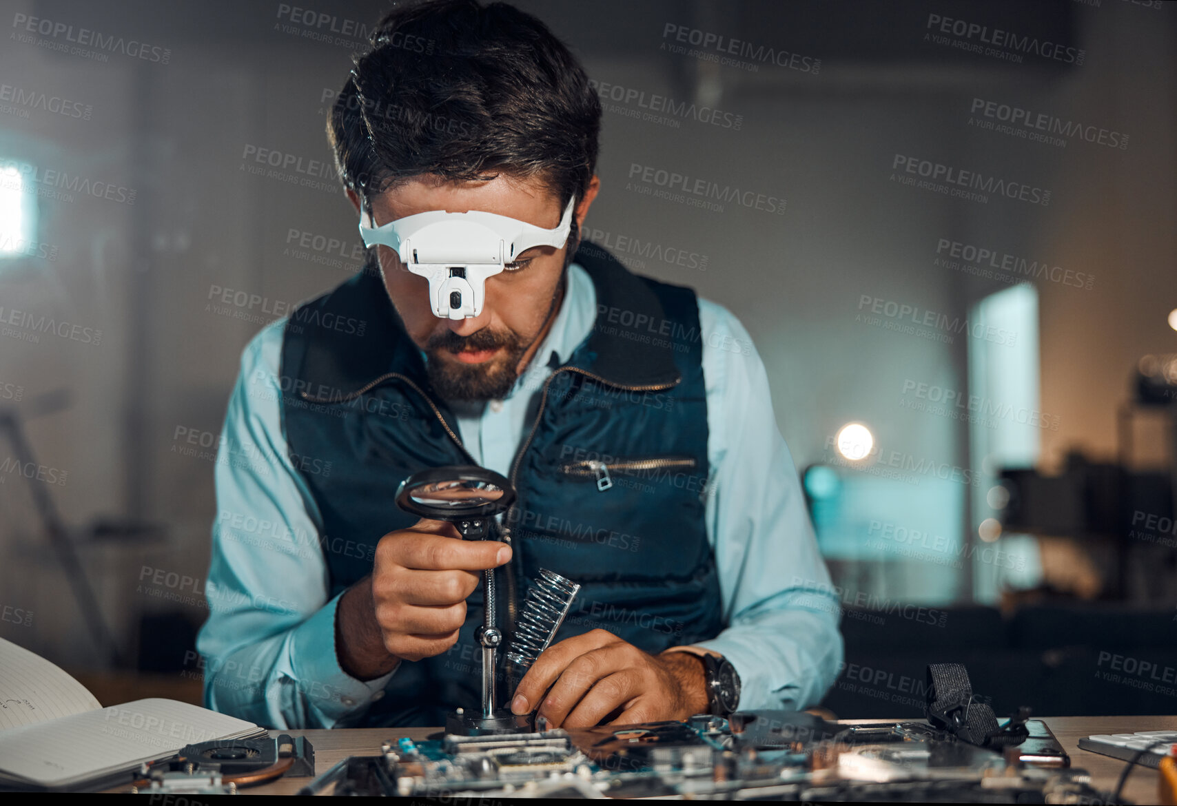 Buy stock photo Technician, engineer and IT professional repair motherboard, microcircuit or electronic device in a workshop or shop. Person, man and guy fixing hardware of a computer for technology in a lab