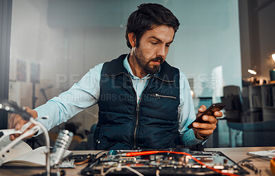 Buy stock photo Computer hardware repair, phone and it worker watch a diy video to fix a semiconductor and circuit. Engineering, workshop and electric work of a male engineer with a mobile doing electrical project