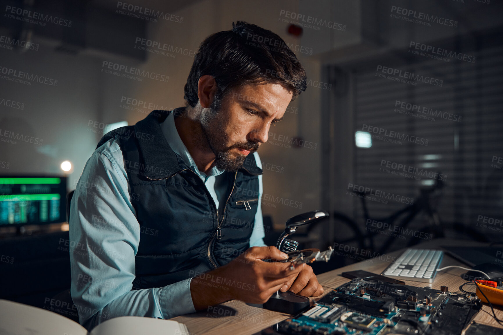 Buy stock photo Man, circuit and it repair workshop in night for maintenance, computer tech or industry with focus. Technician, motherboard and information technology in dark with electronics, engineering and tools