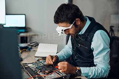 Buy stock photo Technician, computer and engineer repair motherboard, microcircuit or electronic device in a workshop or shop. Person, man and guy fixing hardware with electric meter for technology in a lab