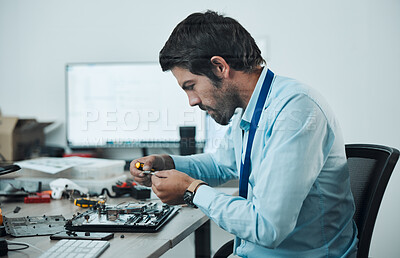 Buy stock photo Man, circuit and tools at repair workshop for maintenance, computer tech or industry with focus. Technician, motherboard and information technology at desk with electronics, engineering and service