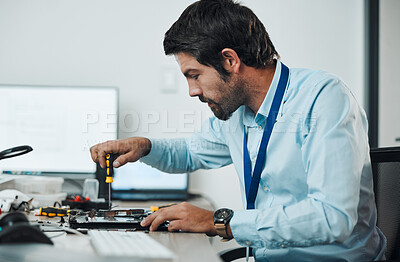 Buy stock photo Serious man, it or screwdriver for motherboard fixing in engineering workshop for database update. Technician, circuit board or tools in repair, maintenance upgrade or information technology industry