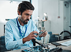 Man, circuit and hard drive in repair workshop for maintenance, computer tech or industry with focus. Technician, motherboard and information technology at desk for electronics, engineering and tools