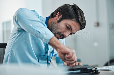 Buy stock photo Laptop, service and screwdriver with an engineer or handyman fixing hardware in an IT office. Computer, information technology and maintenance with a male repair professional at work on electronics 