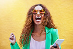 Smile, fashion and face of black woman with phone for social media, internet and 5g connection in city. Communication, smartphone and portrait of excited, happy and stylish girl on yellow background