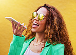 Audio message, conversation and woman on a phone call for communication, connection and chat. Voice assistant, record and girl speaking through a mobile for discussion and talking on a city wall