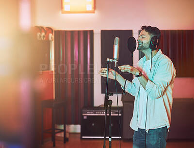 Buy stock photo Musician, microphone or singing in studio for album recording, theatre night performance or radio industry. Man, singer or artist with headphones for production, theater melody or jazz karaoke media