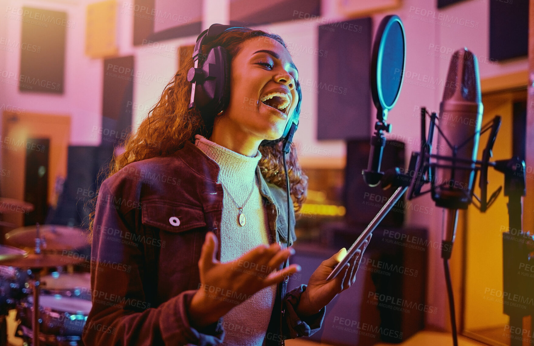 Buy stock photo Tablet, music and woman singing in a studio for radio, song production and rehearsal. Creative, voice and a singer making a record, track or recording a musical sound as a professional artist