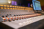 Sound board, music and production in recording studio with creativity and audio equipment. Mixing console with buttons, dj and technology with art, amplifier and produce song with entertainment