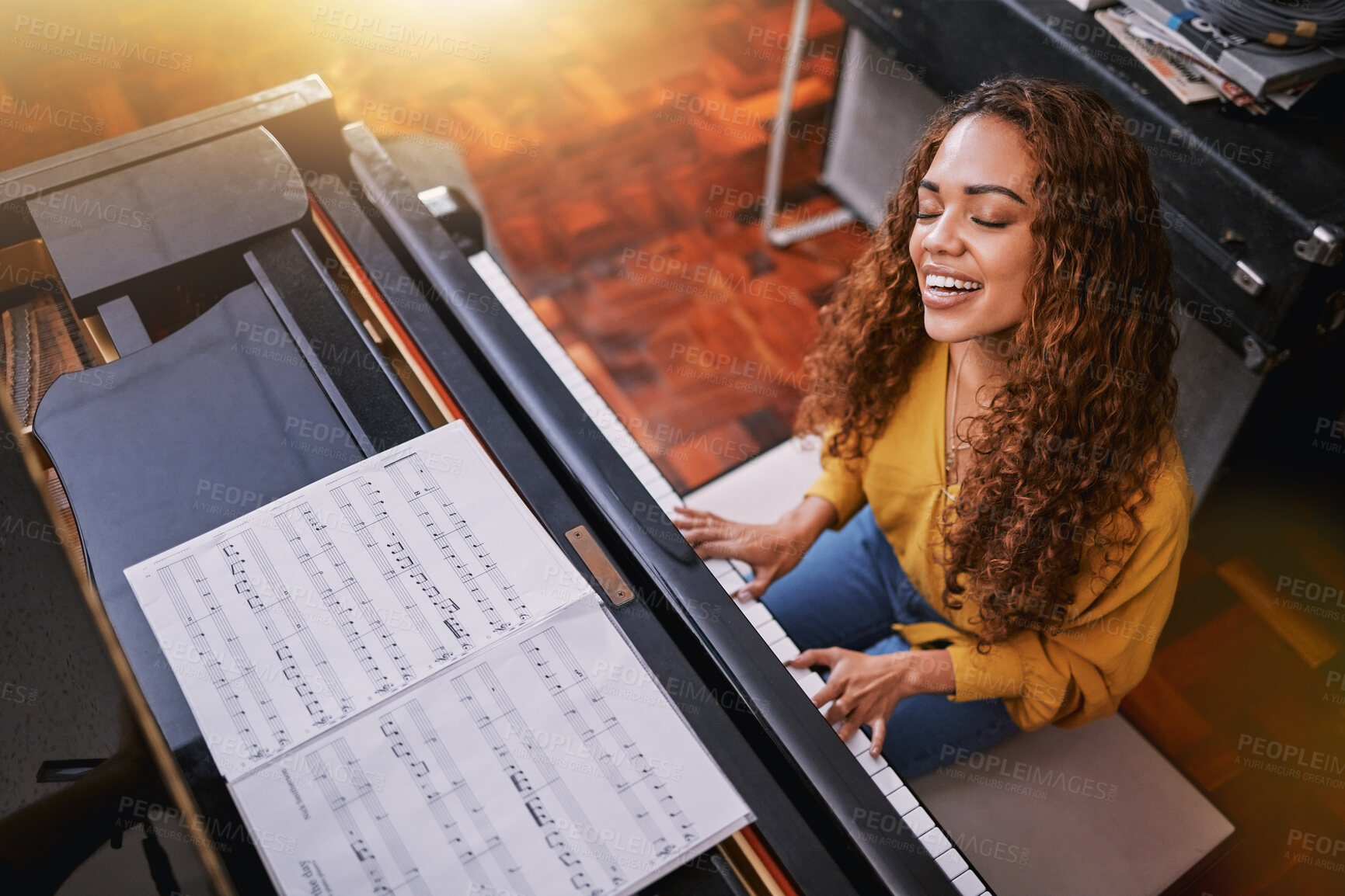 Buy stock photo Woman, singing and playing piano with music notes and a smile in home for musician talent and keys. Young person, artist or singer happy about performance and sound of voice and instrument