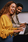 Friends, musicians and playing piano in studio album recording, night learning or education coaching for label industry. Smile, happy and singer woman with pianist instrument for radio collaboration