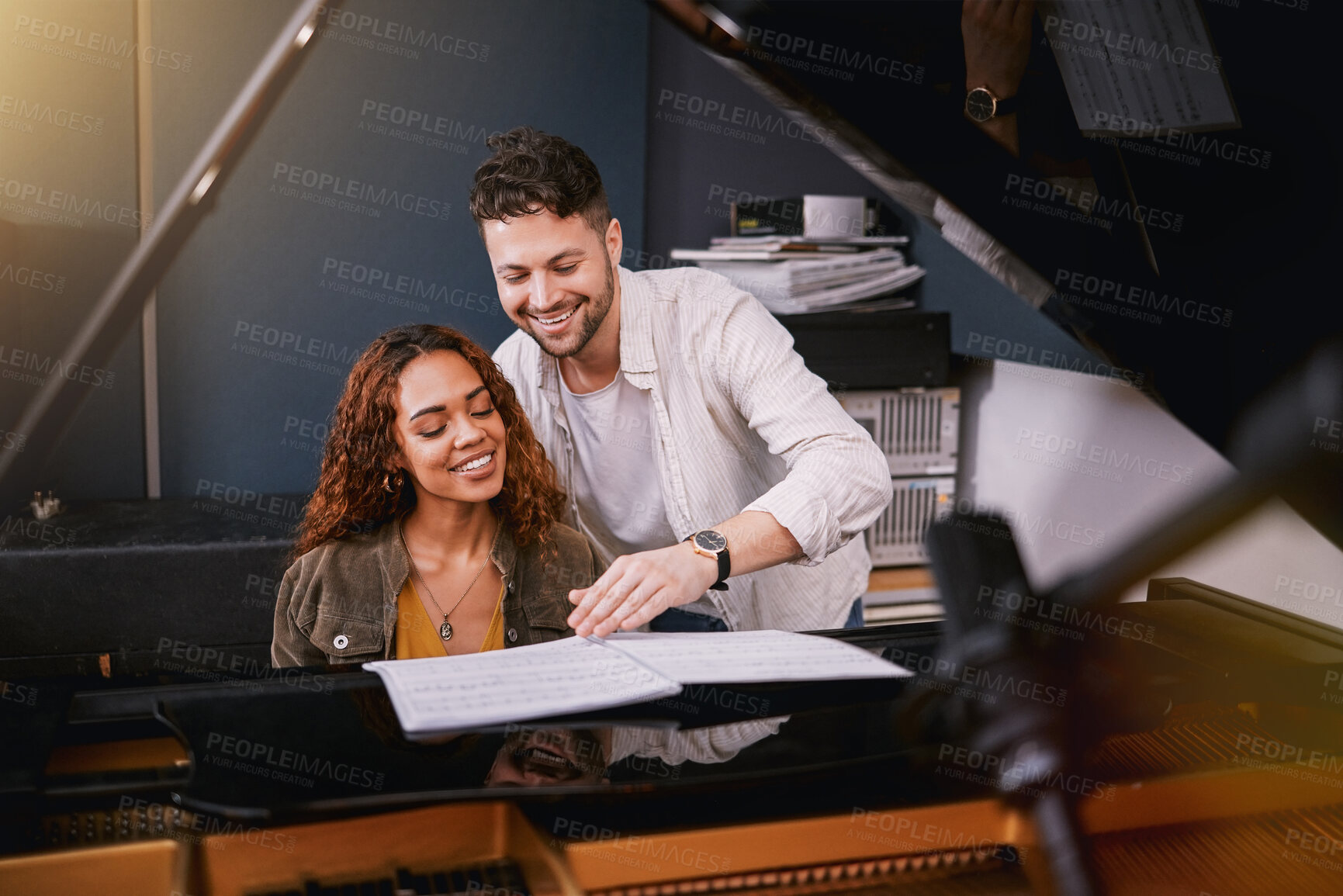 Buy stock photo Musicians, piano and people writing music in a creative or recording studio with a song book. Art, creativity and couple in production of album or sound track together with a musical instrument.