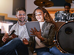 Creative, songwriter and tablet with black couple in recording studio for music, lyrics planning or internet. Production, technology and social media with man and woman for musician, audio or digital