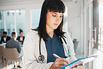 Doctor, woman and writing on checklist in hospital for research or wellness report. Healthcare clinic, planning and female medical professional with clipboard to write notes for health information.