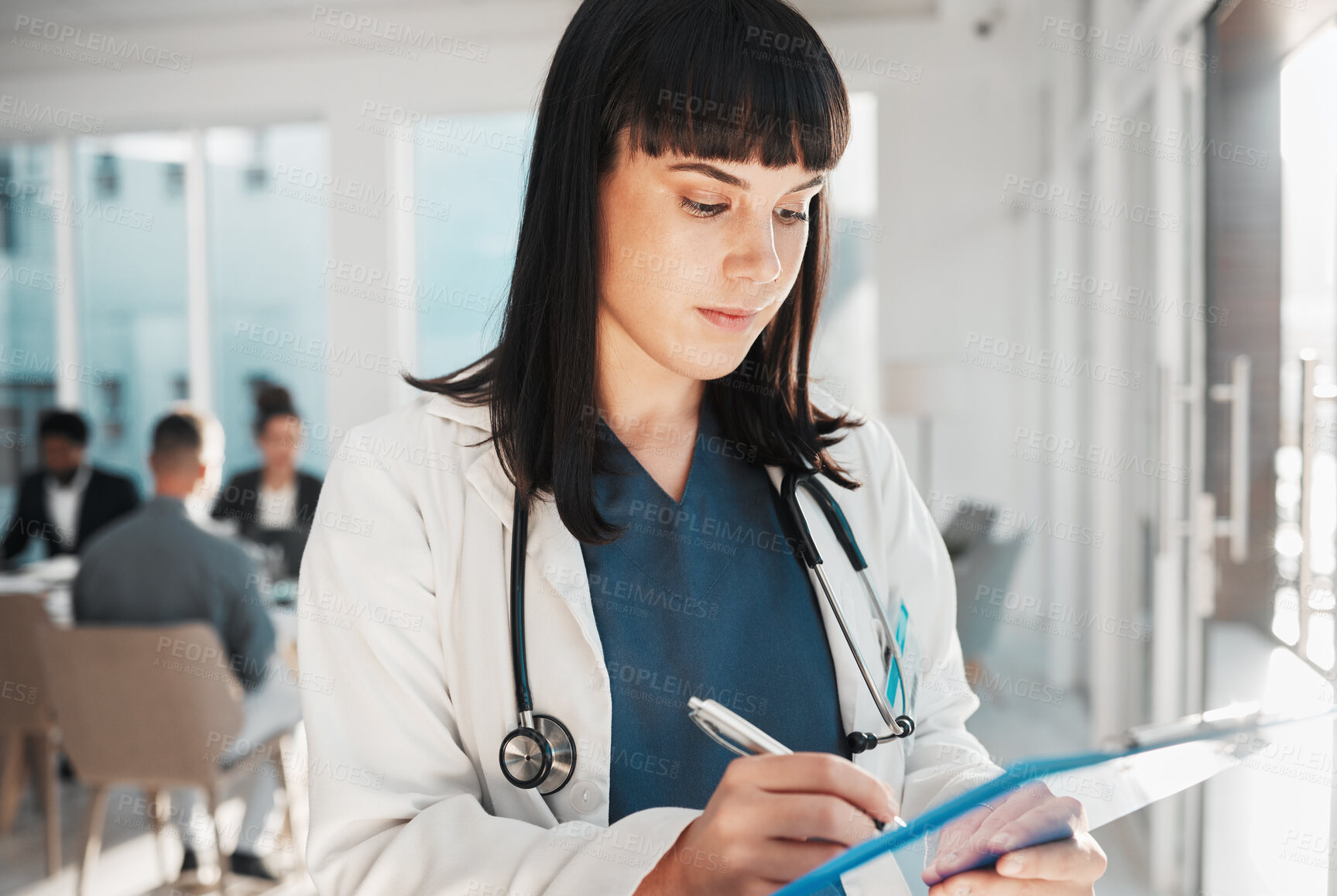 Buy stock photo Doctor, woman and writing on checklist in hospital for research or wellness report. Healthcare clinic, planning and female medical professional with clipboard to write notes for health information.