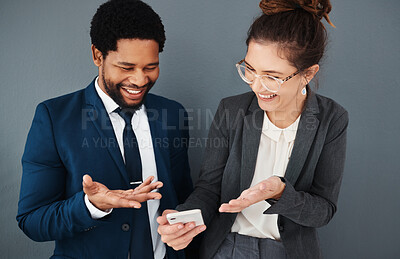 Buy stock photo Phone, business people and friends laughing in office on social media, texting or web browsing. Technology, comic or coworkers, black man and woman with mobile smartphone laugh at funny internet meme