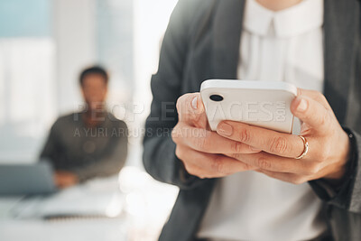 Buy stock photo Hands, business phone and typing in office, texting or social media in company workplace. Technology, cellphone and woman or female entrepreneur with mobile smartphone for networking or web browsing.