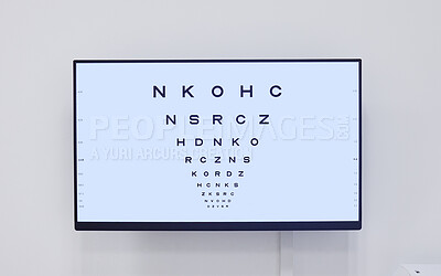 Buy stock photo Eye chart, television and screen in hospital for optometry examination, vision and wellness. Healthcare, eyecare tv and technology with snellen chart for eyesight test, ophthalmology and eyes health