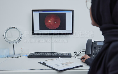 Buy stock photo Eye analysis, optometry and a doctor with a computer for research on a retina and lens problem. Ophthalmology, technology and Muslim woman looking at a monitor screen for eyesight and optic analytics