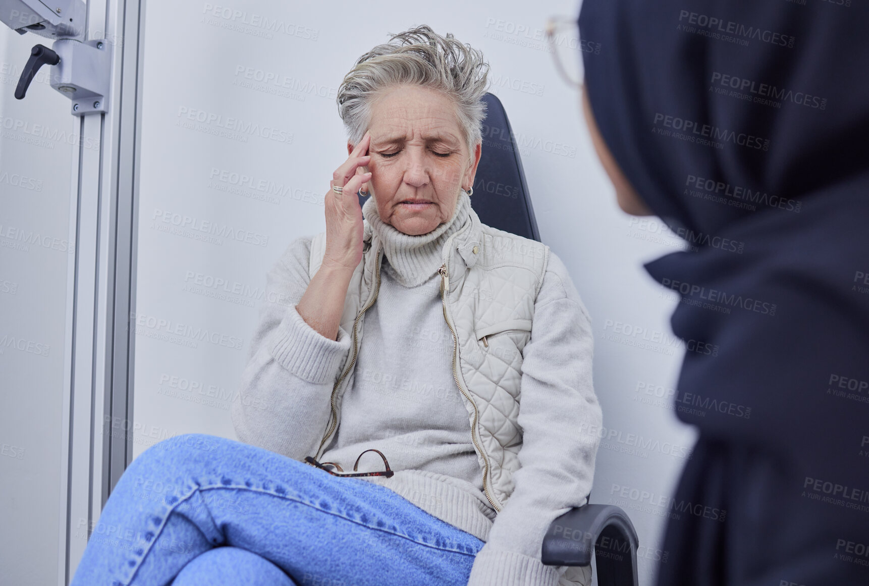 Buy stock photo Blind, headache and optometry with a senior woman patient in an optician office for a test or eye exam. Doctor, pain and medical with a mature female sitting at the optometrist for visual impairment