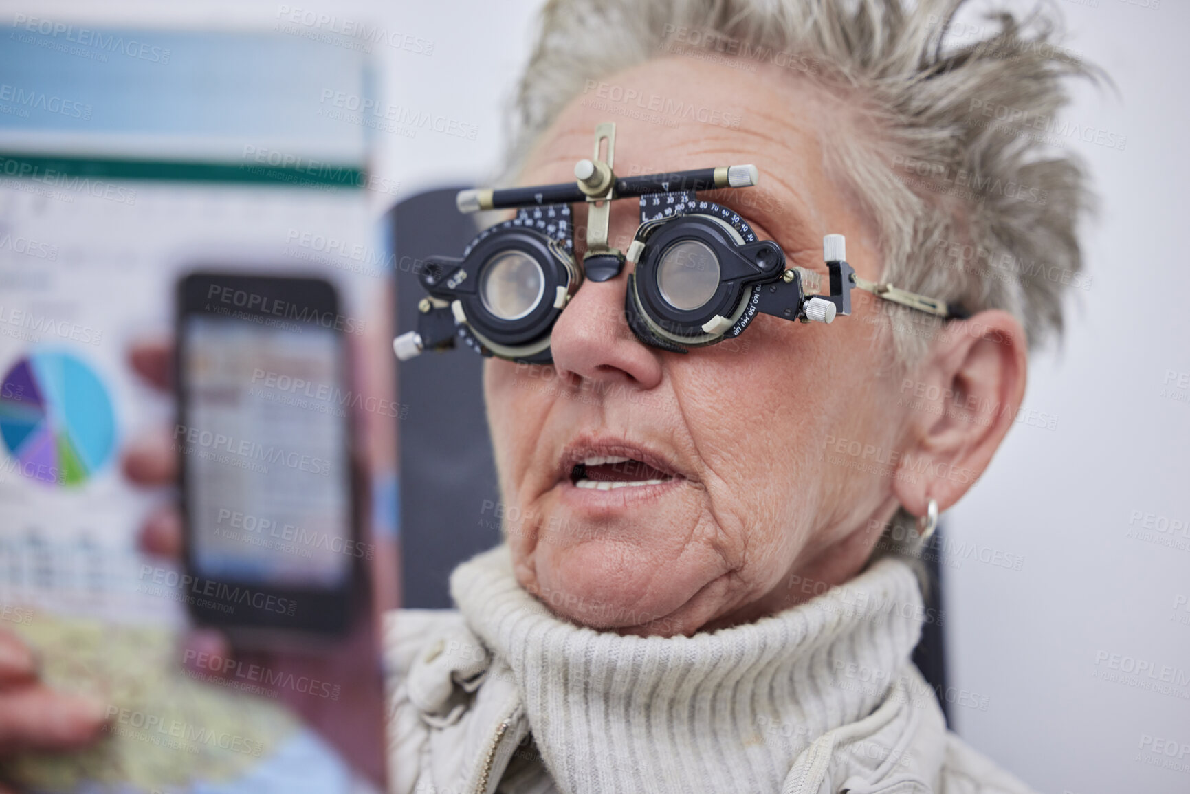 Buy stock photo Eye exam, reading and senior woman with frame in clinic for vision, eyesight and optical assessment. Optometry, healthcare and elderly patient face with optician lens, medical glasses and test eyes