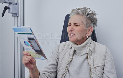 Buy stock photo Senior woman, optometrist office and reading for snellen test, nearsighted problem or hospital consultation room. Elderly patient, healthcare or paper for eyes, focus and retirement at clinic check