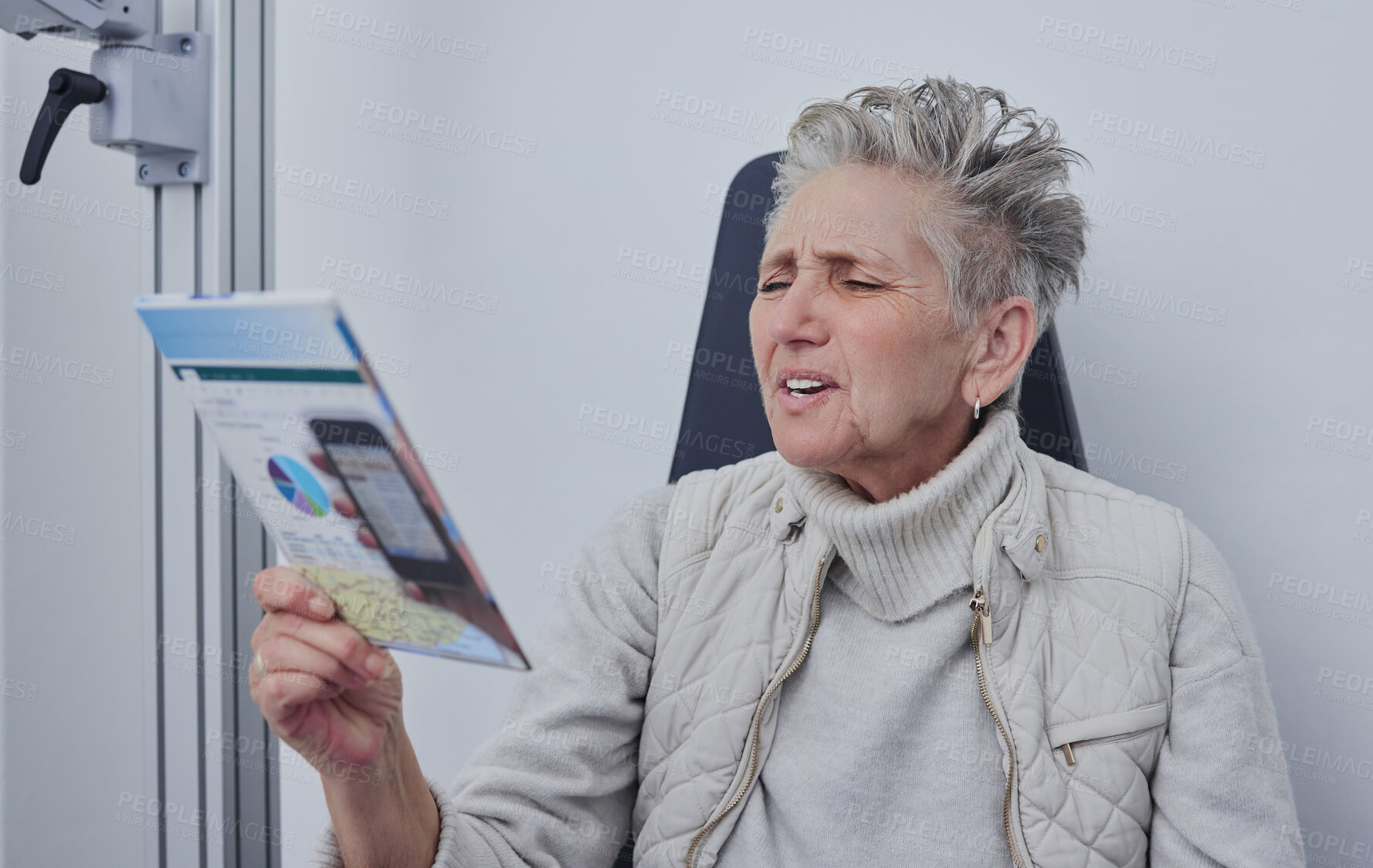 Buy stock photo Senior woman, optometrist office and reading for snellen test, nearsighted problem or hospital consultation room. Elderly patient, healthcare or paper for eyes, focus and retirement at clinic check