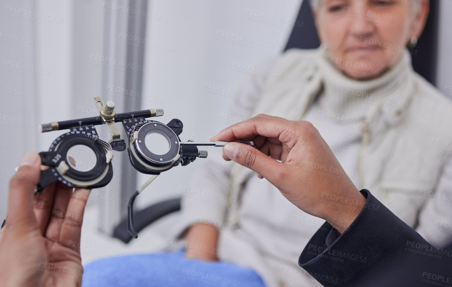 Buy stock photo Optometrist hands, test glasses and senior woman for health advice and helping hand in consultation room. Elderly patient, healthcare or doctor for eyes, reading or eyesight in retirement at clinic