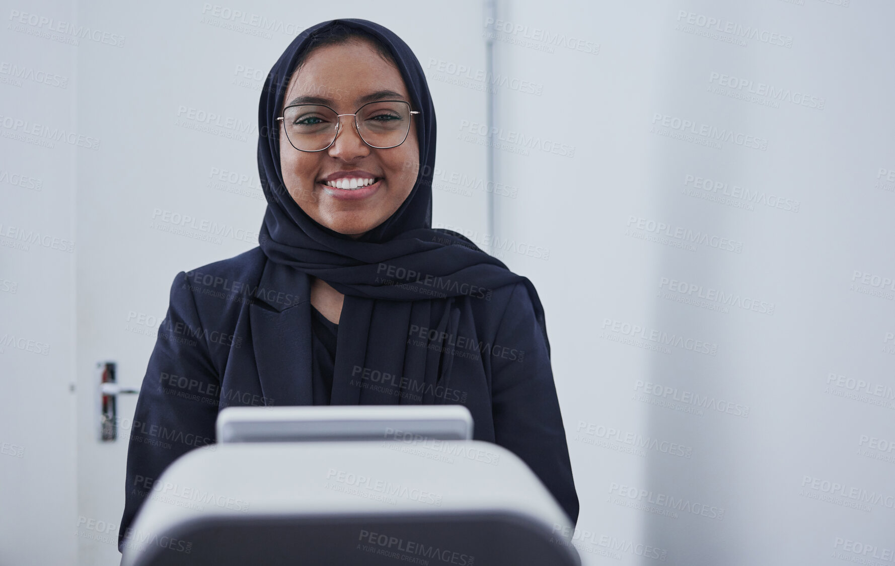 Buy stock photo Optometry, smile and portrait of a Muslim woman with a machine for a vision test and eye care check. Ophthalmology, service and Islamic optician smiling with equipment for a lens checkup at clinic