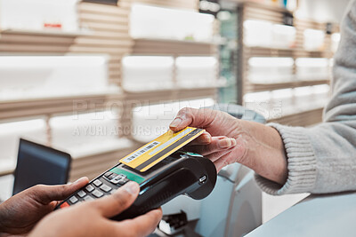 Buy stock photo Hands, credit card and machine for payment, banking transaction or ecommerce at eye clinic or store. Hand of customer tapping debit in transact for purchase, electronic pay or POS at optometry shop