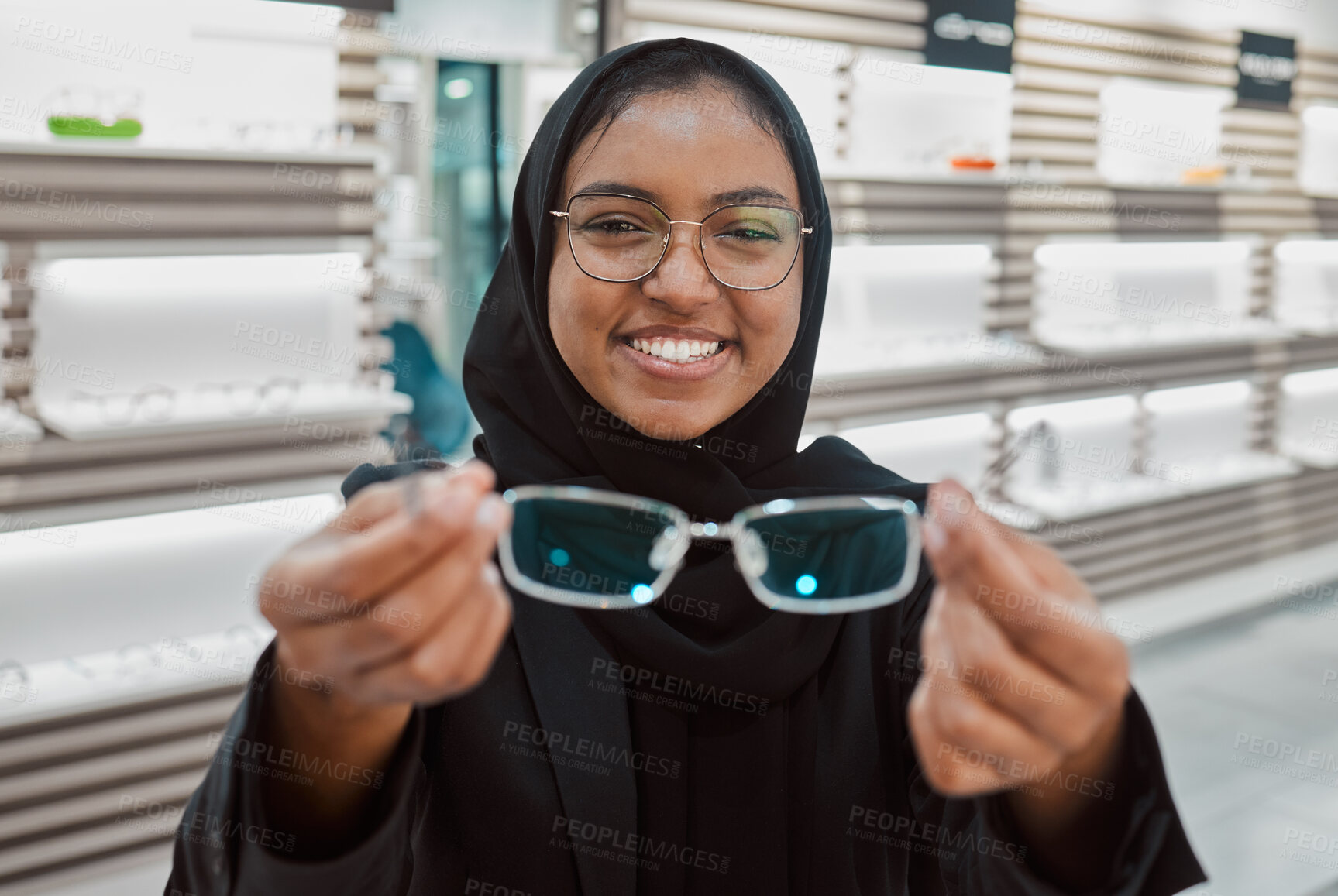 Buy stock photo Optometry, portrait and Muslim woman with glasses for vision, help and shopping at a store. Working, retail and Islamic optician helping with eyewear fitting, consultation and eye care frame