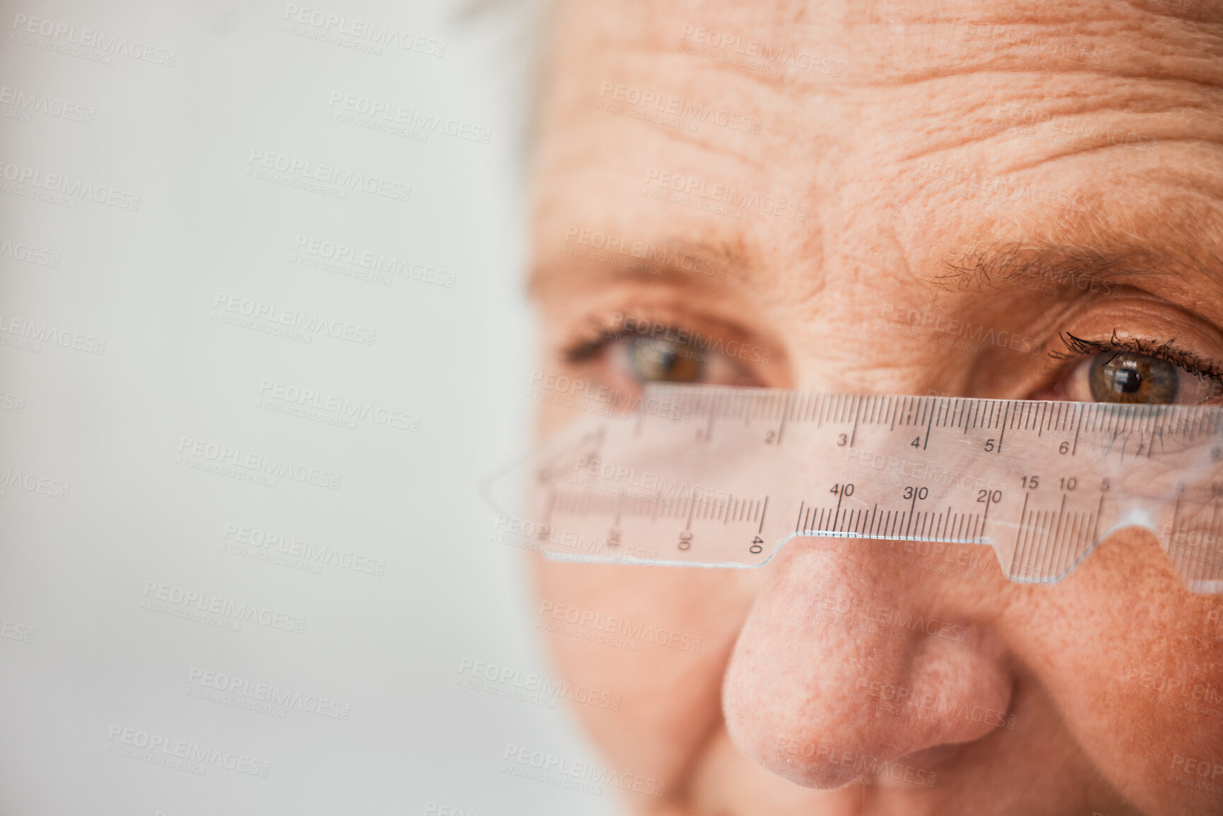 Buy stock photo Ophthalmology, ruler and measuring with eyes of old woman for healthcare, medical and vision. Medicine, optometry and consulting with patient and test for lens, problem and optician in clinic