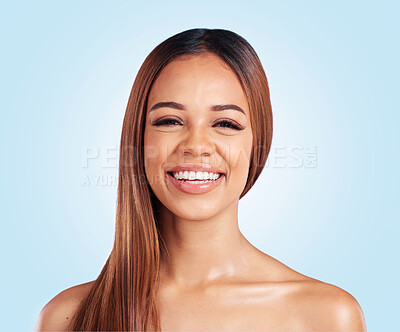 Buy stock photo Portrait, face and hair with a model black woman in studio on a blue background for natural haircare. Beauty, skincare and keratin with an attractive young female feeling proud of her hairstyle